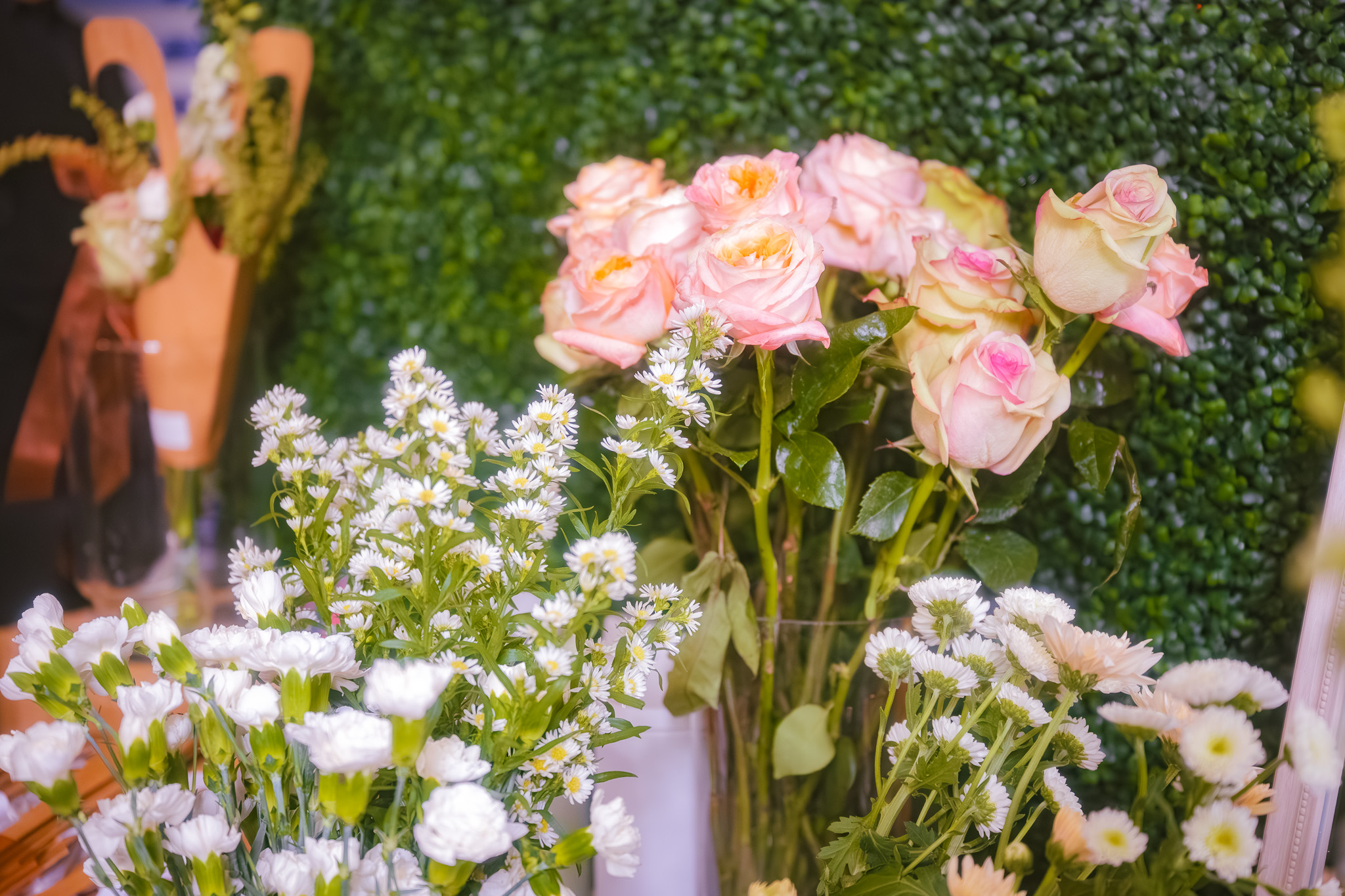Guest holding floral bar bouquet